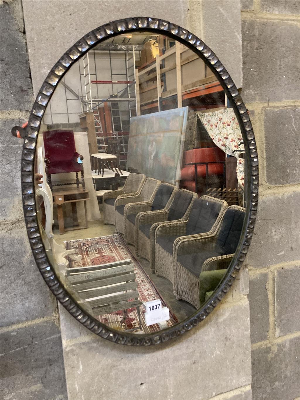 An oval Irish style wall mirror, width 48cm, height 64cm